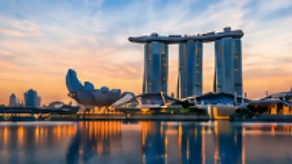 Marina Bay Sands and the ArtScience Museum reflected in the bay at sunrise, Singapore